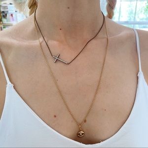 Reversible cross necklace